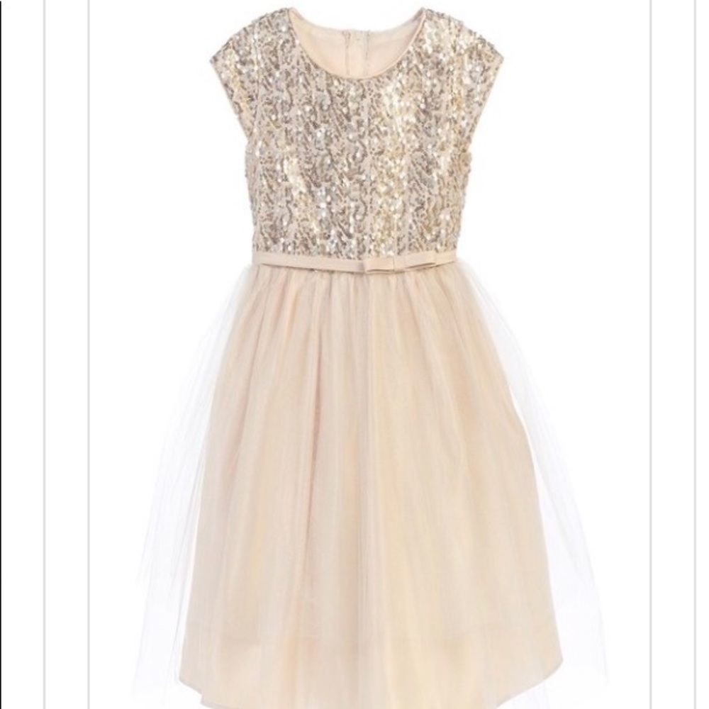 A sparkly, gold party dress for a little girl!